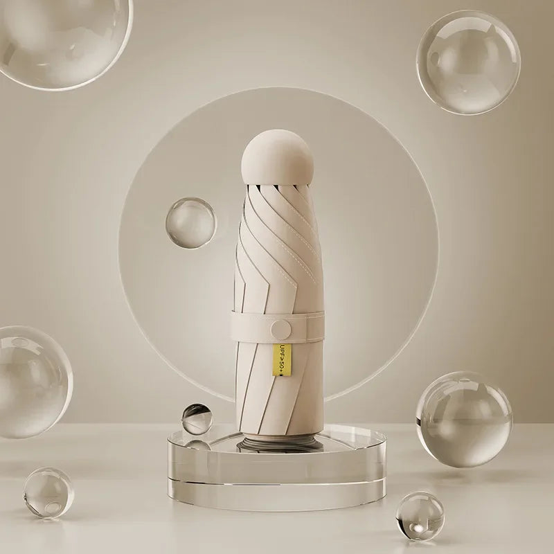 Faltbarer Mini Regenschirm mit schwarzer Gummilegierung