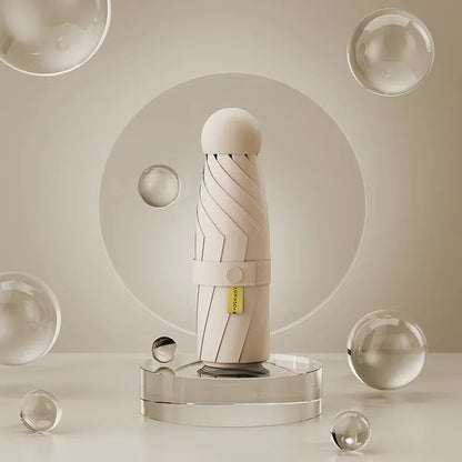 Faltbarer Mini Regenschirm mit schwarzer Gummilegierung