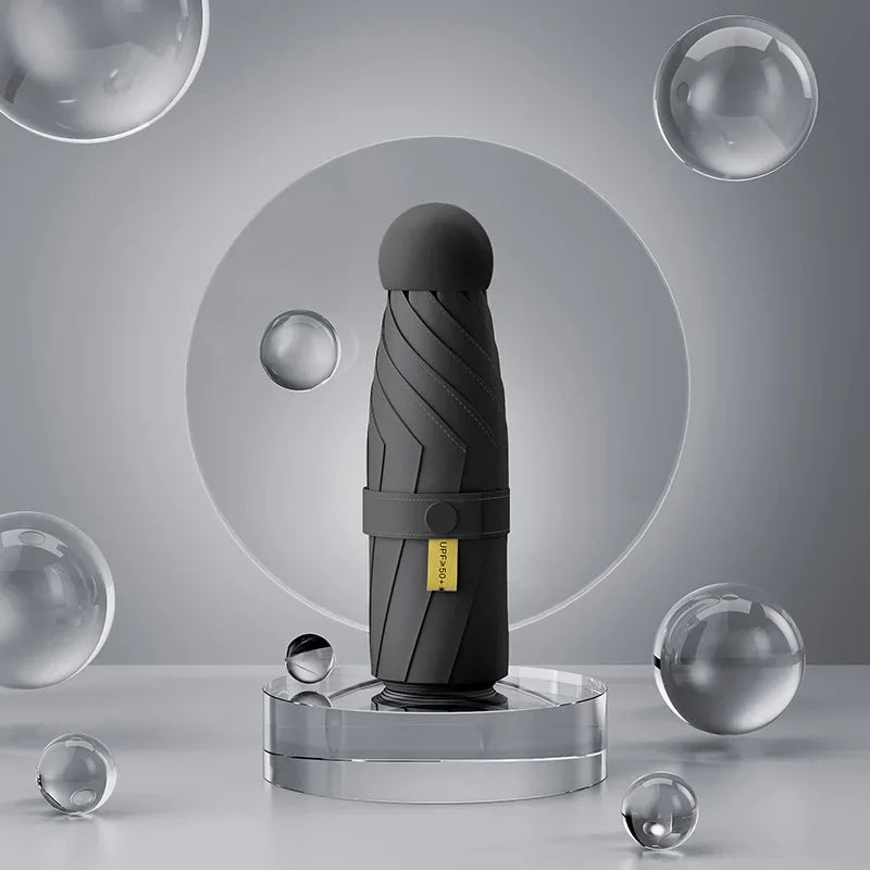 Faltbarer Mini Regenschirm mit schwarzer Gummilegierung